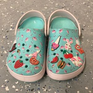 Teal Flamingo Crocs with Jibbets size J1